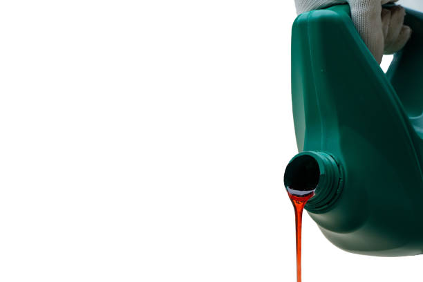 Pour a brand new  clean synthetic engine oil isolated on white,Periodic oil change concept,Plastic canister with synthetic oil