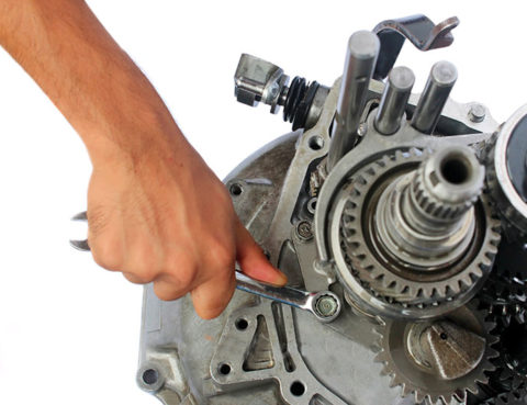 automotive gearbox repairing on isolated background