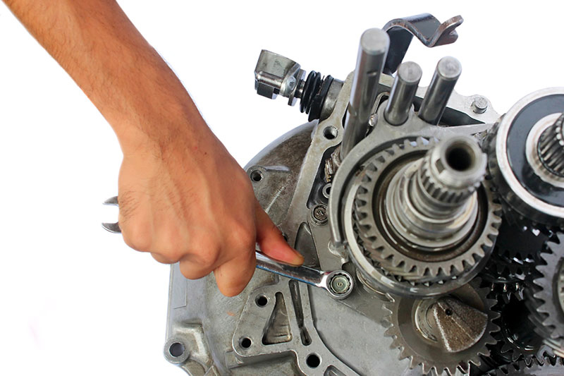 automotive gearbox repairing on isolated background